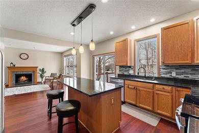 Sun-filled and magnificent, this impressive two-story on Eagle Valley Golf Course in Minnesota - for sale on GolfHomes.com, golf home, golf lot