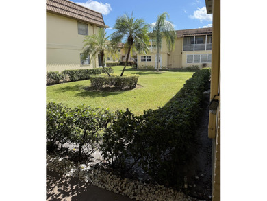 Beautifully updated corner unit 2BR/2BA condo in the desirable on Addison Reserve in Florida - for sale on GolfHomes.com, golf home, golf lot
