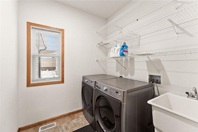 Sun-filled and magnificent, this impressive two-story on Eagle Valley Golf Course in Minnesota - for sale on GolfHomes.com, golf home, golf lot