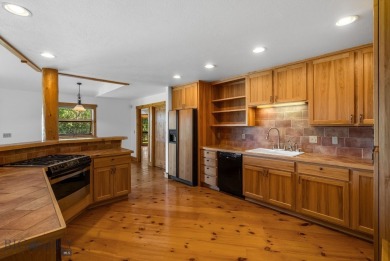 Situated along a quiet drive amongst quaking aspen groves and on Bridger Creek Golf Course in Montana - for sale on GolfHomes.com, golf home, golf lot