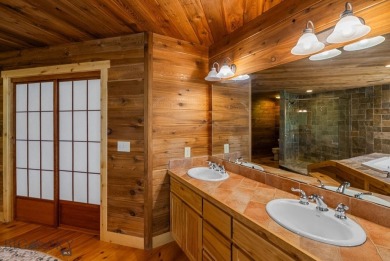 Situated along a quiet drive amongst quaking aspen groves and on Bridger Creek Golf Course in Montana - for sale on GolfHomes.com, golf home, golf lot