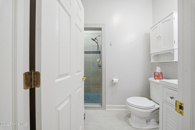 Coastal magnificence! This gorgeous brick home on nearly one on Sound Golf Links at Albemarle Plantation in North Carolina - for sale on GolfHomes.com, golf home, golf lot