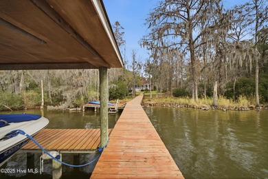 Coastal magnificence! This gorgeous brick home on nearly one on Sound Golf Links at Albemarle Plantation in North Carolina - for sale on GolfHomes.com, golf home, golf lot