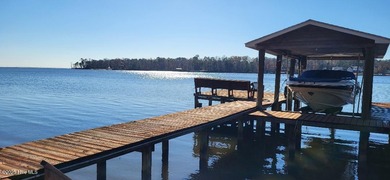 Coastal magnificence! This gorgeous brick home on nearly one on Sound Golf Links at Albemarle Plantation in North Carolina - for sale on GolfHomes.com, golf home, golf lot