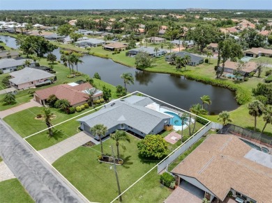 A newly renovated residence with a stunning water view is poised on Sarasota National Golf Club in Florida - for sale on GolfHomes.com, golf home, golf lot