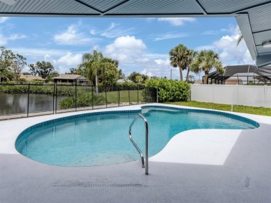 A newly renovated residence with a stunning water view is poised on Sarasota National Golf Club in Florida - for sale on GolfHomes.com, golf home, golf lot