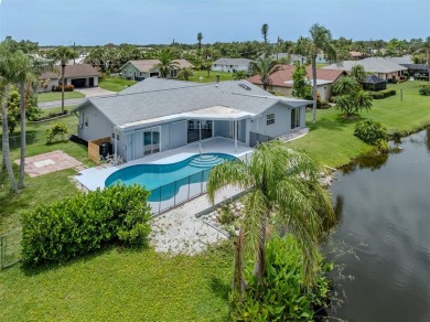 A newly renovated residence with a stunning water view is poised on Sarasota National Golf Club in Florida - for sale on GolfHomes.com, golf home, golf lot