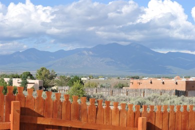 This is a remarkable custom home built in 2025 by renowned local on Taos Country Club in New Mexico - for sale on GolfHomes.com, golf home, golf lot