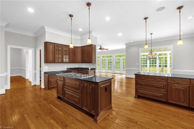 Luxury meets lifestyle in this exceptional estate located in on Sedgefield Golf Course in North Carolina - for sale on GolfHomes.com, golf home, golf lot