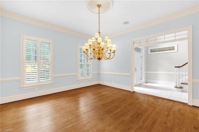 Luxury meets lifestyle in this exceptional estate located in on Sedgefield Golf Course in North Carolina - for sale on GolfHomes.com, golf home, golf lot