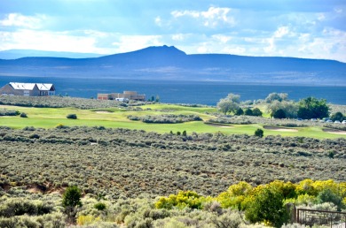This is a remarkable custom home built in 2025 by renowned local on Taos Country Club in New Mexico - for sale on GolfHomes.com, golf home, golf lot