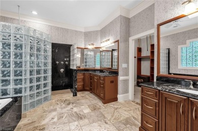 Luxury meets lifestyle in this exceptional estate located in on Sedgefield Golf Course in North Carolina - for sale on GolfHomes.com, golf home, golf lot