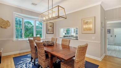 This stunning 3 bedroom, 3.5 bath home, designed by the renowned on The Oaks Club in Florida - for sale on GolfHomes.com, golf home, golf lot