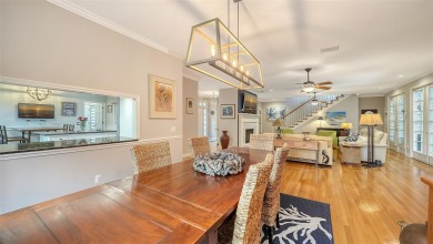 This stunning 3 bedroom, 3.5 bath home, designed by the renowned on The Oaks Club in Florida - for sale on GolfHomes.com, golf home, golf lot