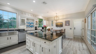 This stunning 3 bedroom, 3.5 bath home, designed by the renowned on The Oaks Club in Florida - for sale on GolfHomes.com, golf home, golf lot