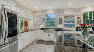 This stunning 3 bedroom, 3.5 bath home, designed by the renowned on The Oaks Club in Florida - for sale on GolfHomes.com, golf home, golf lot