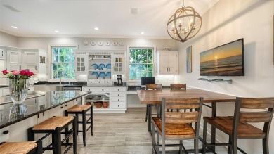 This stunning 3 bedroom, 3.5 bath home, designed by the renowned on The Oaks Club in Florida - for sale on GolfHomes.com, golf home, golf lot