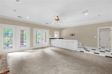 Luxury meets lifestyle in this exceptional estate located in on Sedgefield Golf Course in North Carolina - for sale on GolfHomes.com, golf home, golf lot
