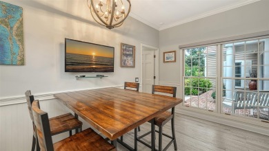 This stunning 3 bedroom, 3.5 bath home, designed by the renowned on The Oaks Club in Florida - for sale on GolfHomes.com, golf home, golf lot