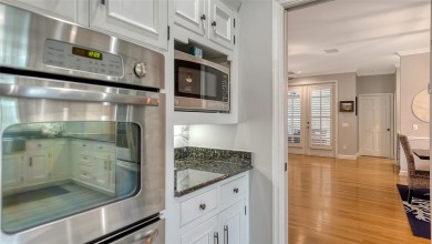 This stunning 3 bedroom, 3.5 bath home, designed by the renowned on The Oaks Club in Florida - for sale on GolfHomes.com, golf home, golf lot