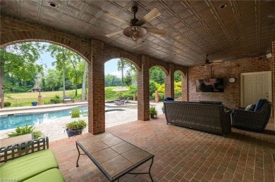 Luxury meets lifestyle in this exceptional estate located in on Sedgefield Golf Course in North Carolina - for sale on GolfHomes.com, golf home, golf lot