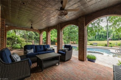 Luxury meets lifestyle in this exceptional estate located in on Sedgefield Golf Course in North Carolina - for sale on GolfHomes.com, golf home, golf lot