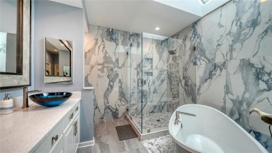 This stunning 3 bedroom, 3.5 bath home, designed by the renowned on The Oaks Club in Florida - for sale on GolfHomes.com, golf home, golf lot