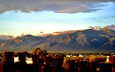 This is a remarkable custom home built in 2025 by renowned local on Taos Country Club in New Mexico - for sale on GolfHomes.com, golf home, golf lot