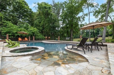 Luxury meets lifestyle in this exceptional estate located in on Sedgefield Golf Course in North Carolina - for sale on GolfHomes.com, golf home, golf lot