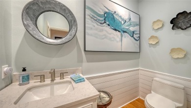 This stunning 3 bedroom, 3.5 bath home, designed by the renowned on The Oaks Club in Florida - for sale on GolfHomes.com, golf home, golf lot