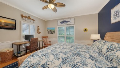 This stunning 3 bedroom, 3.5 bath home, designed by the renowned on The Oaks Club in Florida - for sale on GolfHomes.com, golf home, golf lot