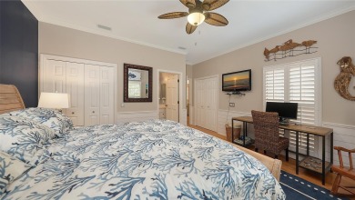 This stunning 3 bedroom, 3.5 bath home, designed by the renowned on The Oaks Club in Florida - for sale on GolfHomes.com, golf home, golf lot