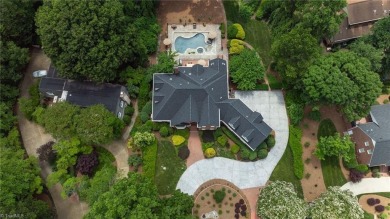 Luxury meets lifestyle in this exceptional estate located in on Sedgefield Golf Course in North Carolina - for sale on GolfHomes.com, golf home, golf lot