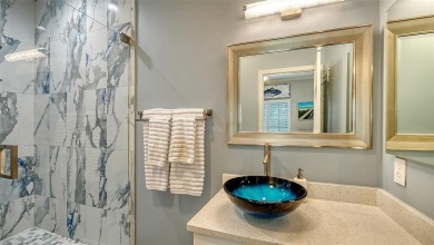 This stunning 3 bedroom, 3.5 bath home, designed by the renowned on The Oaks Club in Florida - for sale on GolfHomes.com, golf home, golf lot