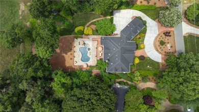 Luxury meets lifestyle in this exceptional estate located in on Sedgefield Golf Course in North Carolina - for sale on GolfHomes.com, golf home, golf lot