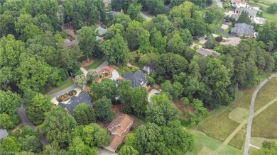 Luxury meets lifestyle in this exceptional estate located in on Sedgefield Golf Course in North Carolina - for sale on GolfHomes.com, golf home, golf lot