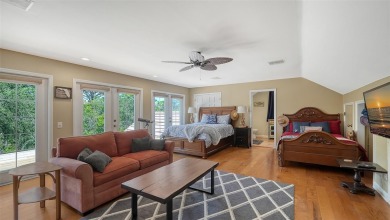 This stunning 3 bedroom, 3.5 bath home, designed by the renowned on The Oaks Club in Florida - for sale on GolfHomes.com, golf home, golf lot