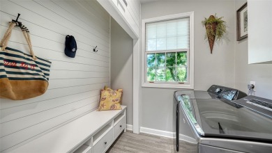 This stunning 3 bedroom, 3.5 bath home, designed by the renowned on The Oaks Club in Florida - for sale on GolfHomes.com, golf home, golf lot