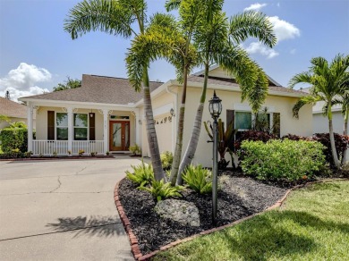 A charming three-bedroom, two-bath, desirable two-car side entry on The River Club in Florida - for sale on GolfHomes.com, golf home, golf lot