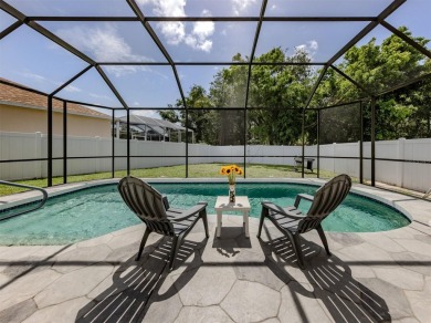 A charming three-bedroom, two-bath, desirable two-car side entry on The River Club in Florida - for sale on GolfHomes.com, golf home, golf lot