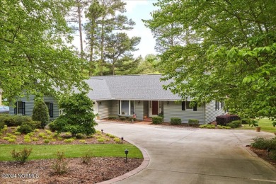 This immaculate home is situated on the Fairway of the 8th hole on Seven Lakes Country Club in North Carolina - for sale on GolfHomes.com, golf home, golf lot