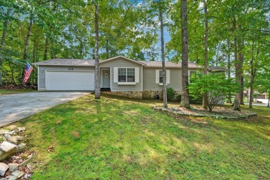 Enjoy lake views of St. George from this beautifully updated 1 on Druid Hills Golf Club in Tennessee - for sale on GolfHomes.com, golf home, golf lot
