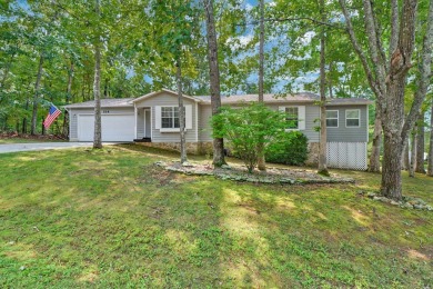 Enjoy lake views of St. George from this beautifully updated 1 on Druid Hills Golf Club in Tennessee - for sale on GolfHomes.com, golf home, golf lot