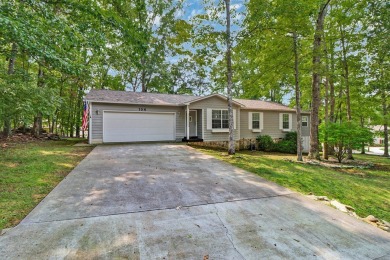 Enjoy lake views of St. George from this beautifully updated 1 on Druid Hills Golf Club in Tennessee - for sale on GolfHomes.com, golf home, golf lot