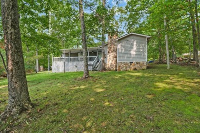 Enjoy lake views of St. George from this beautifully updated 1 on Druid Hills Golf Club in Tennessee - for sale on GolfHomes.com, golf home, golf lot