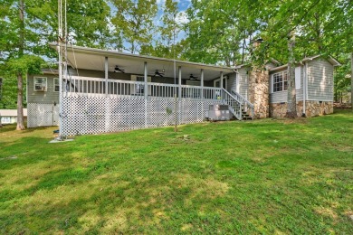 Enjoy lake views of St. George from this beautifully updated 1 on Druid Hills Golf Club in Tennessee - for sale on GolfHomes.com, golf home, golf lot