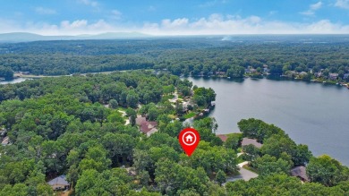 Enjoy lake views of St. George from this beautifully updated 1 on Druid Hills Golf Club in Tennessee - for sale on GolfHomes.com, golf home, golf lot