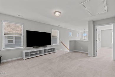 Greeted by a stacked-stone, covered front porch and classic on The Club At Twelve Oaks in North Carolina - for sale on GolfHomes.com, golf home, golf lot