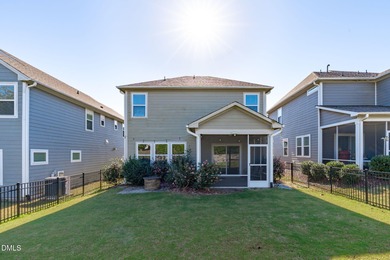 Greeted by a stacked-stone, covered front porch and classic on The Club At Twelve Oaks in North Carolina - for sale on GolfHomes.com, golf home, golf lot