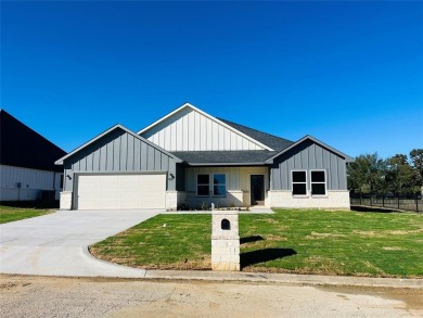 Modern Custom Home with Golf Course Views in Holiday Hill on Holiday Hills Country Club in Texas - for sale on GolfHomes.com, golf home, golf lot